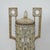 Construction in glass beads, faceted glass and metal containers. The pair of Art Deco style lamps features a cylindrical...