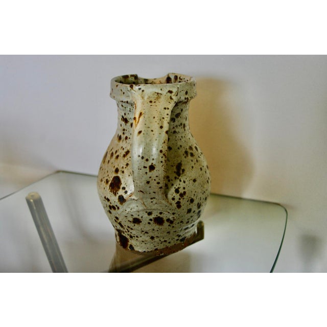Pyrite stoneware pitcher by Gustave Tiffoche, signed, in good condition This piece has an attribution mark, I am sure that...