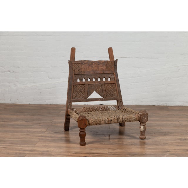 Brown Rustic Indian Low Wooden Chair With Rope Seat and Weathered Appearance For Sale - Image 8 of 16