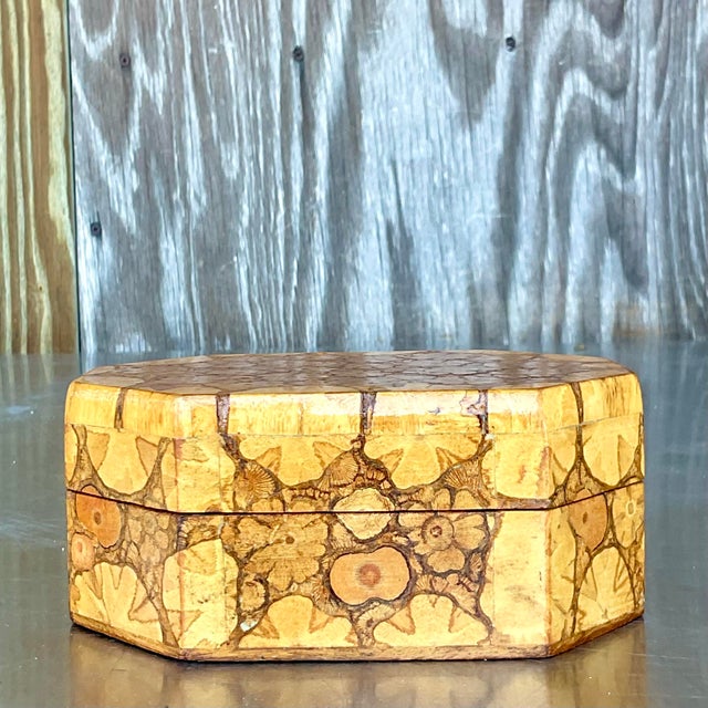 Organize with elegance using our Vintage Boho Burl Wood Box. This American-style piece showcases the natural beauty of...