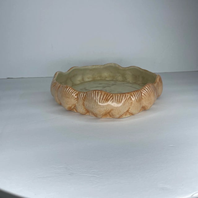 Here is a lovely pink ceramic clamshell lined planter. There are no chips, the cracks you see in the bottom are surface,...