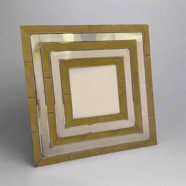 A Gabriella Crespi designed Modernist Picture Frame. A square form in silvered bronze with inset panels of shagreen in...