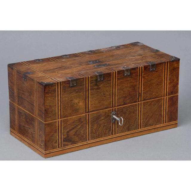 French inlaid rosewood, satinwood and ebonized tea caddy having the two original molded glass lidded bottles and mixing...