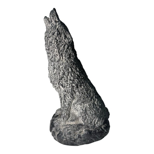Beautiful detailed howling wolf figurine with textured fur and natural stone finish. Solid and heavy piece, great for...