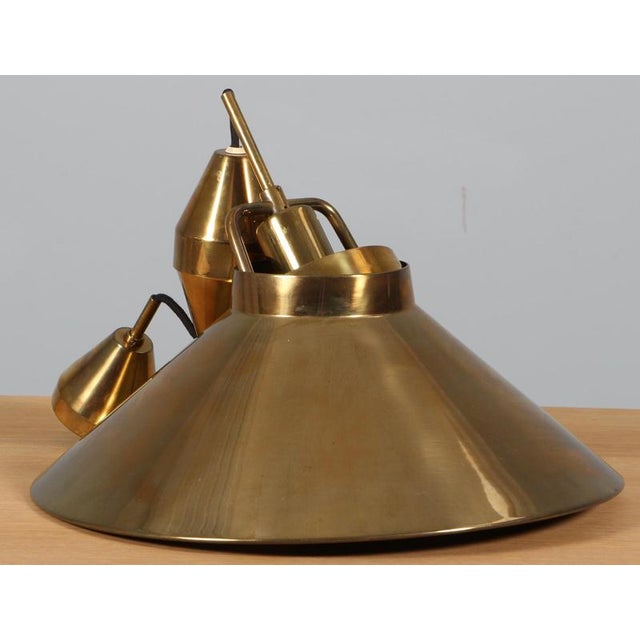 Fritz Schlegel pendant in brass with height adjustment. Made by Lyfa Up to 250V (Europe/UK Standard).The wiring of this...