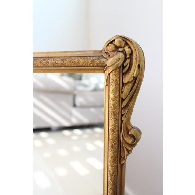 This Louis Philippe style gilded mirror is a lovely showpiece for a simple mantel or a elegant powder room. We love it's...