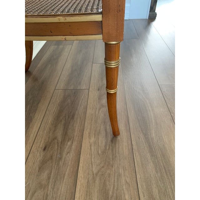 1980s Baker Furniture Hollywood Regency ArmChair Gilt Accents Caned Seat For Sale - Image 9 of 12