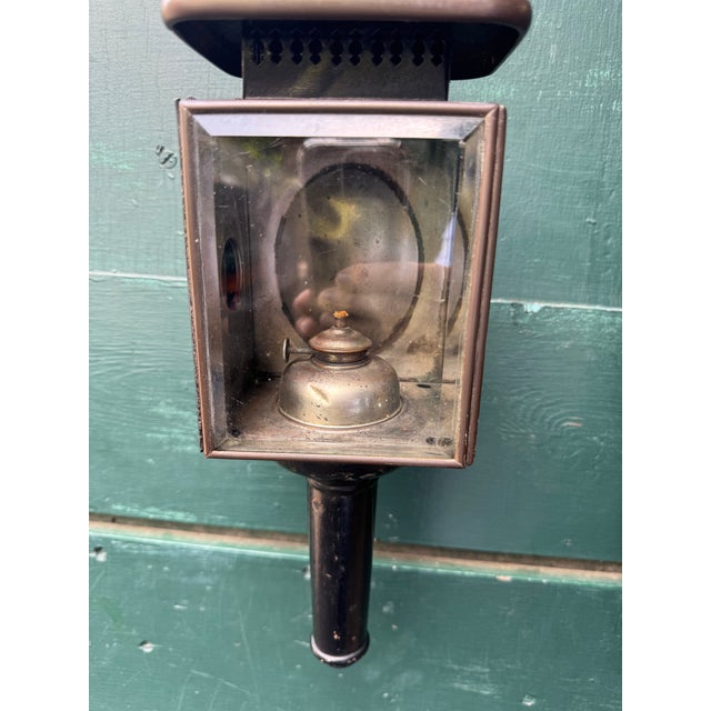 Pair of charming and original coach lanterns from the late 19th century with red glass side markers. Never been wired.