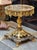Elevate your space with this breathtaking French-style side table, a luxurious accent piece designed with timeless...