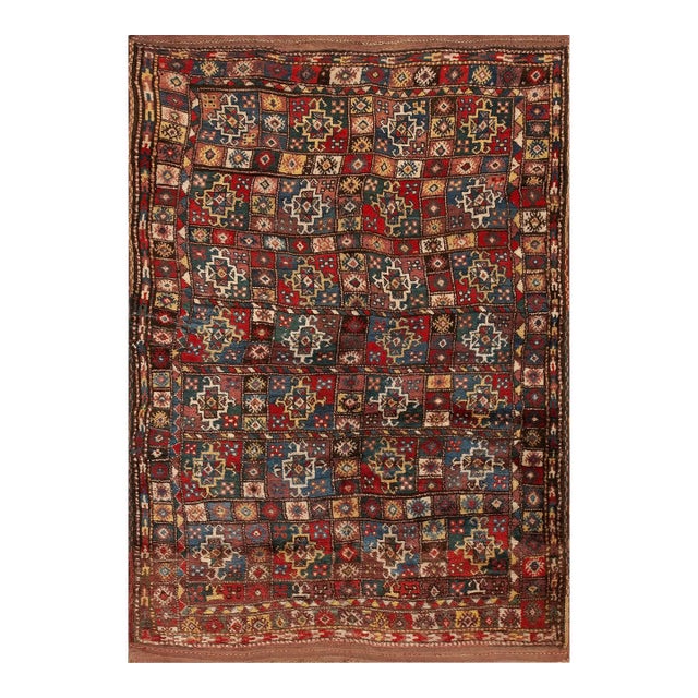 1900s Multicolor Geometric Tribal Antique Persian Quchan Kordi Carpet 5'4'' X 7'8'' Wool Rug For Sale