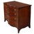 A classic bowfront mahogany chest features four spacious graduated drawers, each fitted with a pair of round brass pulls...