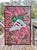 A joyful and vibrant oil on canvas painting from Belgium depicting a figure doing a cartwheel in front of a brick facade....