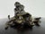 This is a large oval dresser box with a bronze sculpted monkey handle. This box has a dark faux tortoise shell finished to...