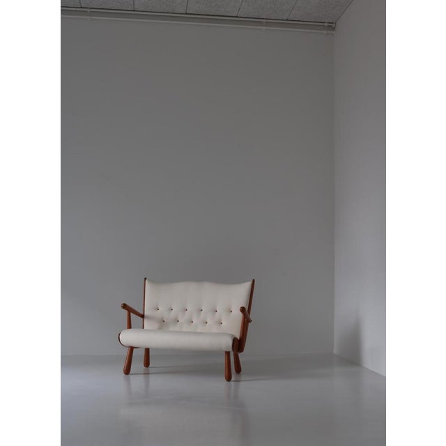 Rare and stunning Scandinavian Modern sofa settee attributed to Philip Arctander and made in the 1940s by a Swedish...