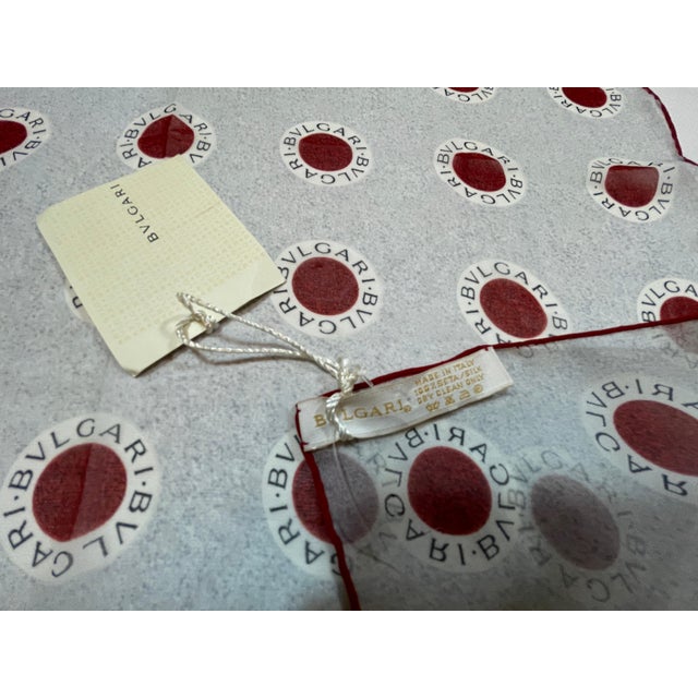 BVLGARI Red Dot Logo Silk Scarf, new with tag. Square Bvlgari georgette silk scarf red dot logo printed motif, hand-sewn...
