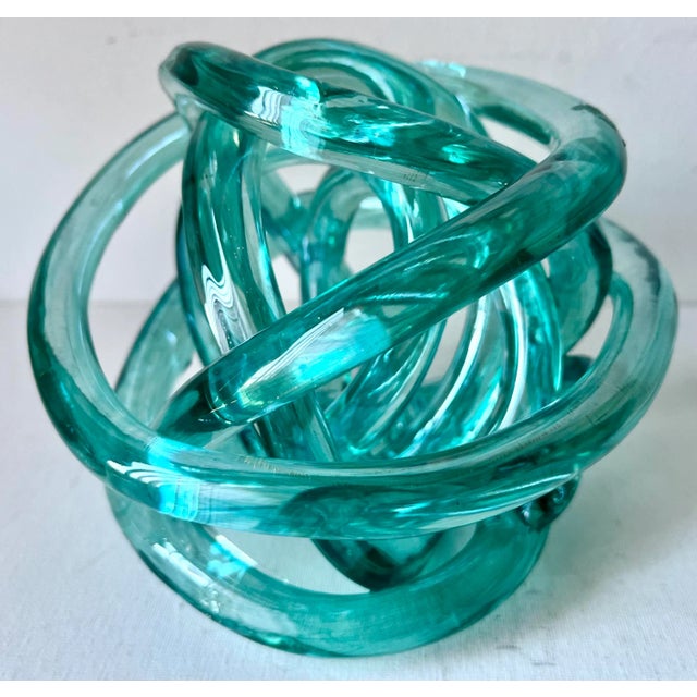 This wonderful large hand-blown glass Turquoise large 'knot' sculpture has tiny Gold flecks creating a lovely color. A...
