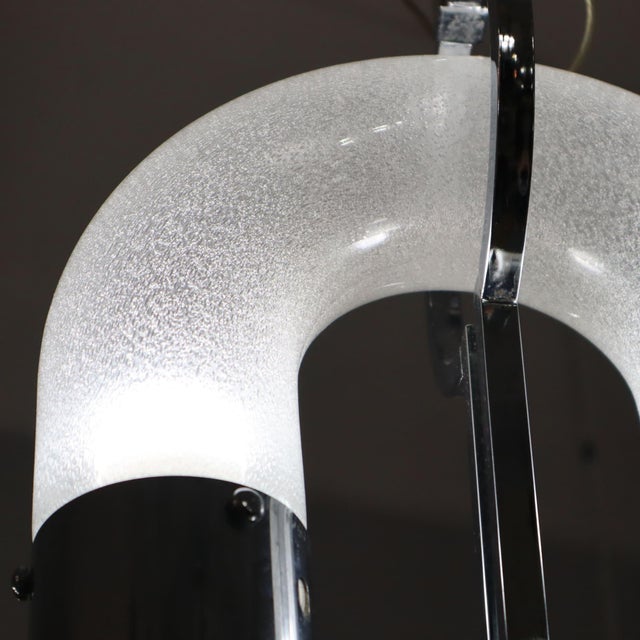 Aldo nason chandelier: the excellence of 70s design the aldo nason chandelier, created in the 1970s, is a perfect...