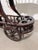 Elegant mahogany drinks trolley featuring beautifully carved details, turned spindle galleries, and large decorative...