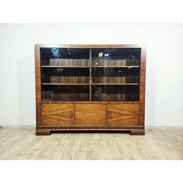 An exceptional, complete study suite from the 1940s, representing the classic European Art Deco style. The furniture is...