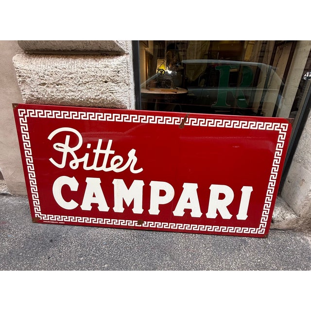 Vintage enamelled iron sign, produced by knights, in good condition, some rust spots due to the passage of time
