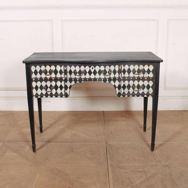 Interesting 19th Century English serpentine front knee hole desk with later harlequin painted decoration. 1890 Knee hole...