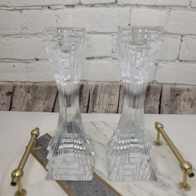 Stunning and luminous, this pair of vintage Mikasa ‘City Lights’ candlestick holders captures the geometric elegance of...