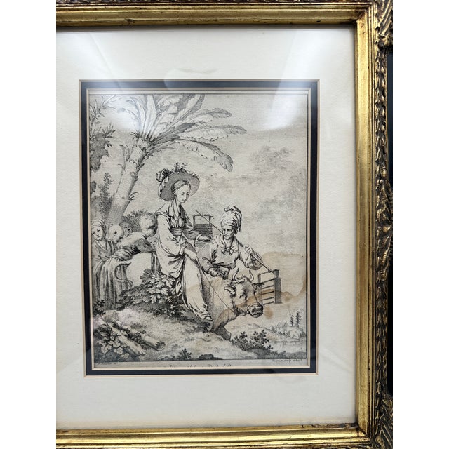 Antique 18th-century French engraving after François Boucher (1703–1770), presented in an ornate black and gilt frame. The...