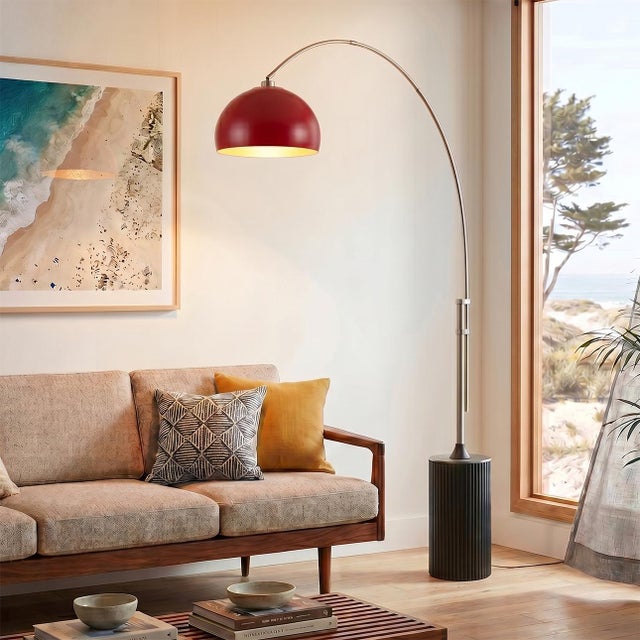 The Tambo Arc Lamp is a striking Mid-Century Modern lighting piece designed by Peter Morelli in 1984. This arc lamp...