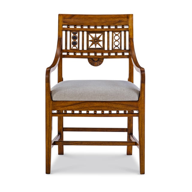 A finely crafted waxed mahogany dining chair that blends neoclassical detailing with everyday refinement. The hand-carved...