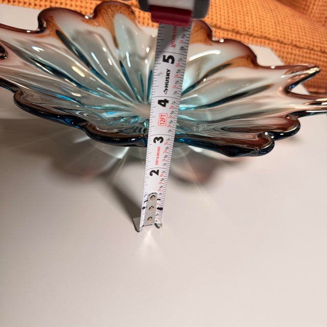 Stunning vintage Murano-style Italian art glass centerpiece bowl, dating to the Mid-Century Modern era. This substantial...