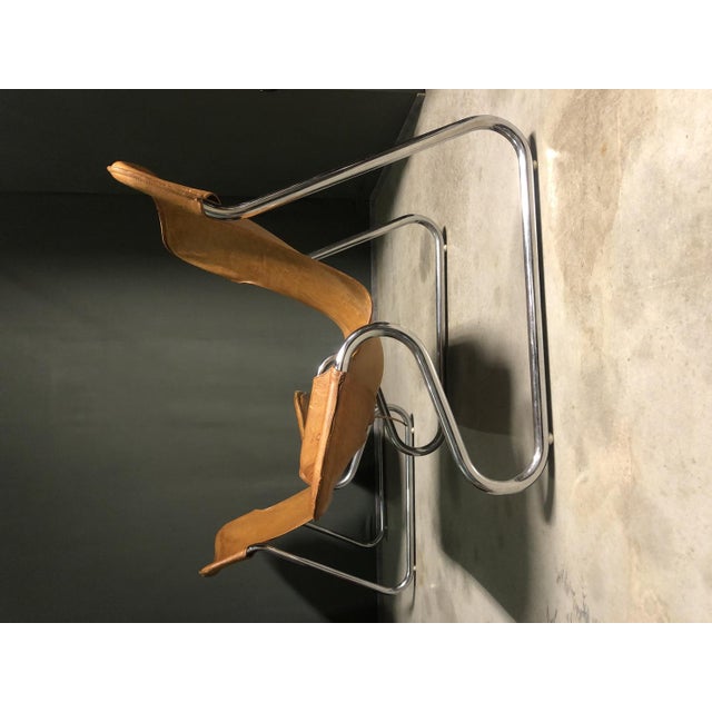 Tan Leather Lounge Chairs, 1970s, Set of 2, in Very Good conditions. Designed 1970 to 1979 This piece is designed in the...