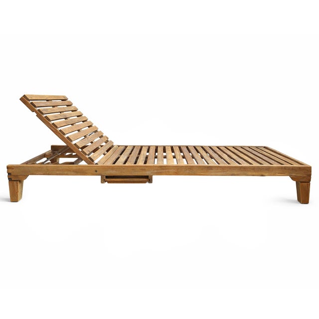 Outdoor natural teak wood slatted chaise lounge chair. Adjustable back height for maximum comfort and versatility. Pull-...