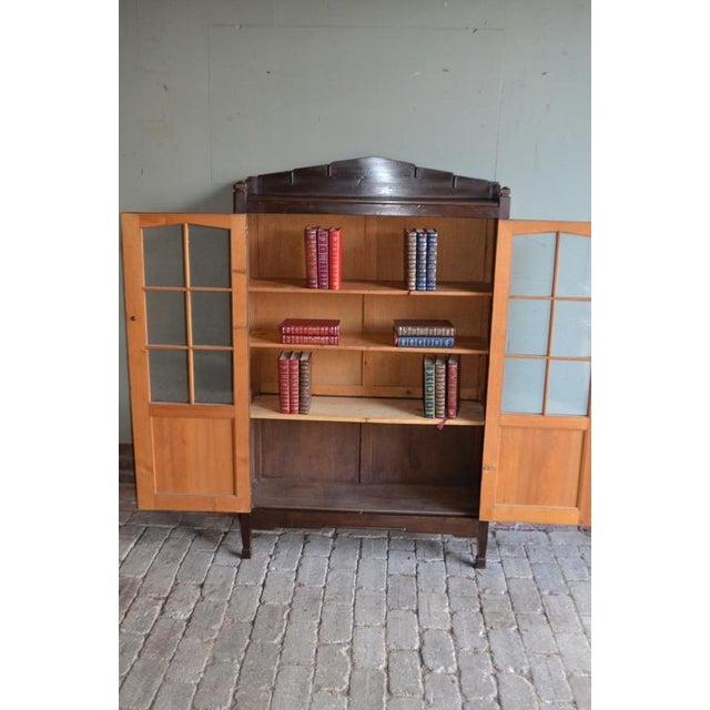 20th century Dutch fruit tree wood Art Deco display cabinet, bookcase, shop cabinet, china cabinet, library cabinet. The...