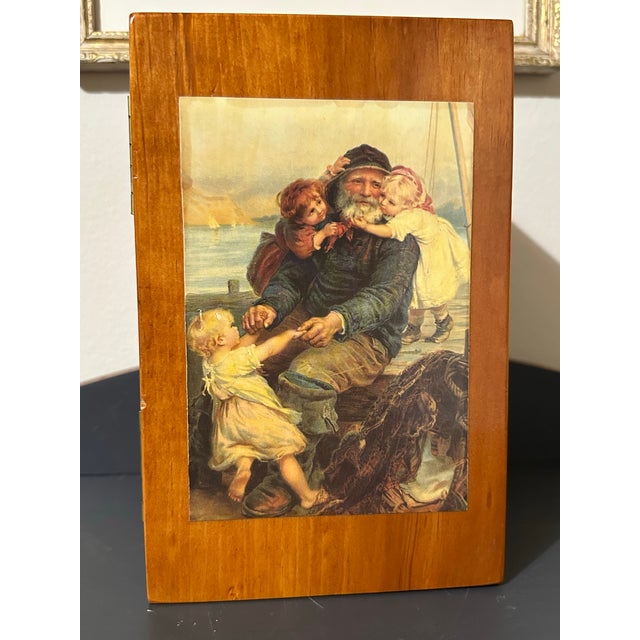 Vintage handcrafted pine tabletop box. The interior is lined with a burgundy velvet material. The top has a print of the...