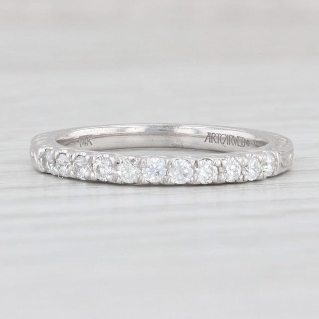 Gemstone Information: - Natural Diamonds - Total Carats - 0.33ctw Cut - Round Brilliant Color - F - G Clarity - VS2 - SI1...