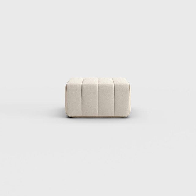 Pouf, stool, ottoman—or simply the building block for what is probably the world’s most versatile sofa system? The Curt...