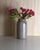 This antique terracotta vase with a patinated finish embodies the traditional craftsmanship of southern France from the...