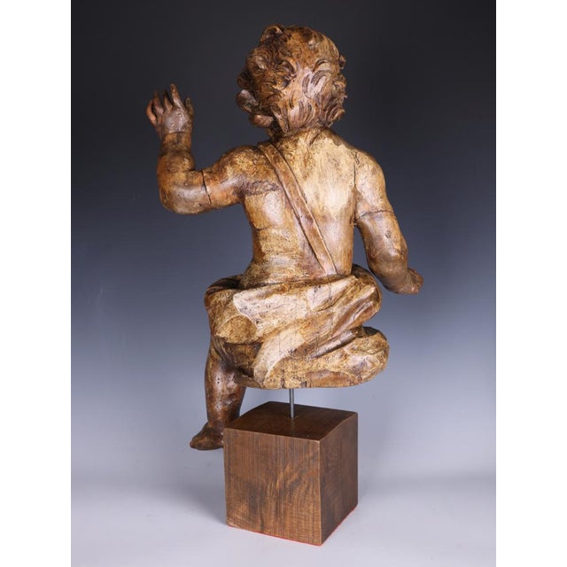 Large Italian Carved Limewood Putto / Cherub Figure, Late 18th – Early 19th Century A charming and highly decorative...