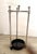 Eichholtz Artman umbrella stand. Its elegant nickel-plated frame consists of three sections, offering space to hold up to...