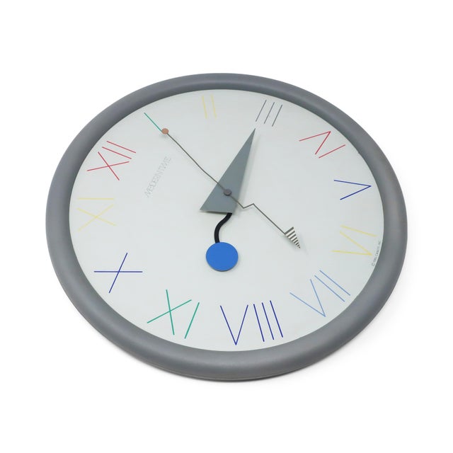 A vibrant postmodern wall clock from Canetti's Moderntime Collection, showcasing the playful geometric abstraction of...
