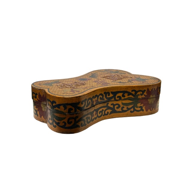 This is a handmade Chinese accent Chinoiserie decorative box made of wood and finished with a distressed brick red base...