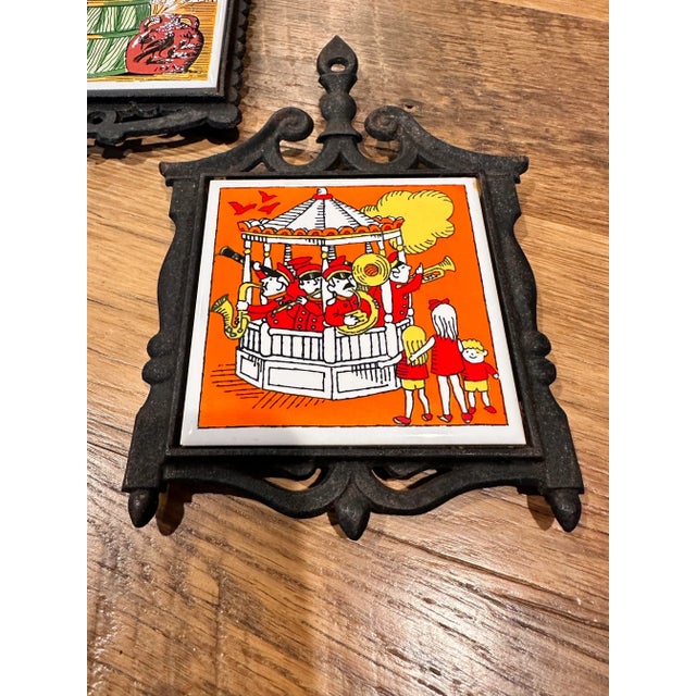 Vintage trivet for decor, wall hanging, or kitchen use. Most likely A Lorrie Design by identifying the tile manufacturer...