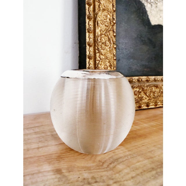 A lovely antique circa 1903 English glass match striker with sterling silver rim. Excellent antique condition, just some...