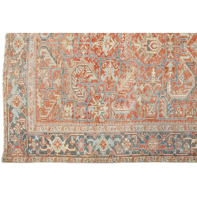 Persian Antique Heriz Wool Rug With an Allover Design Featuring Rust Color Field For Sale - Image 4 of 9