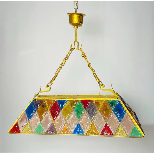 Introducing the Wrought Iron & Hammered Glass Chandelier by Longobard, a stunning piece of Italian craftsmanship from the...