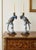 Blue A Pair of Vintage Hollywood Regency Style Blue & White Ceramic Parrot Candle Holders For Sale - Image 8 of 12
