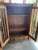 Antique oak glass and wood cabinet.