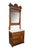 An antique Eastlake Victorian walnut washstand with a matching swivel mirror tower, dating back to the late 19th century....