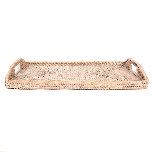 Artifacts Trading Company's hand woven trays and baskets provide the perfect accent to any room in the house with a tight...