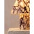 A sculptural mushroom-form table lamp hand-carved from solid Calacatta Viola marble, a rare Italian stone prized for its...